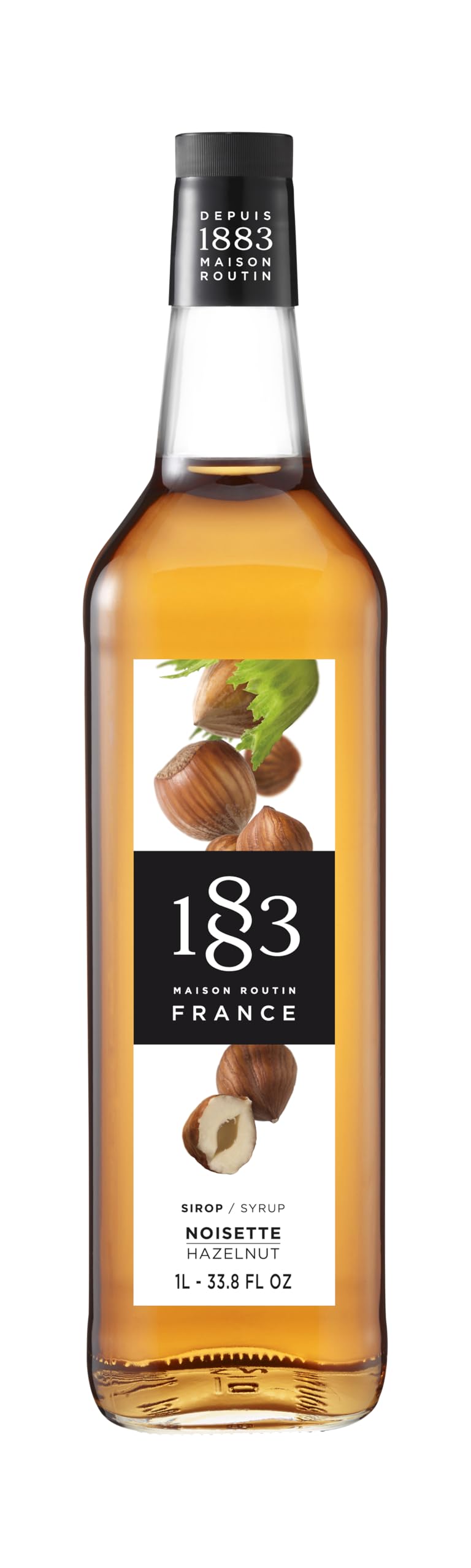 1883 Hazelnut front glass bottle showing elegant label and café-ready presentation