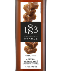 1883 MAISON ROUTIN syrup pouring close-up highlighting texture and easy mixability benefit