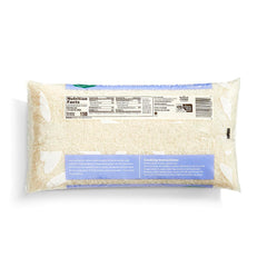 365 by Whole Foods Market jasmine rice cooked in white bowl, fluffy texture ready for meals