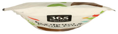 365 by Whole Foods Market spooned into measuring cup for accurate baking