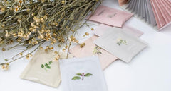 ACORUS flatlay of ginkgo dandelion sage peppermint milk thistle chamomile