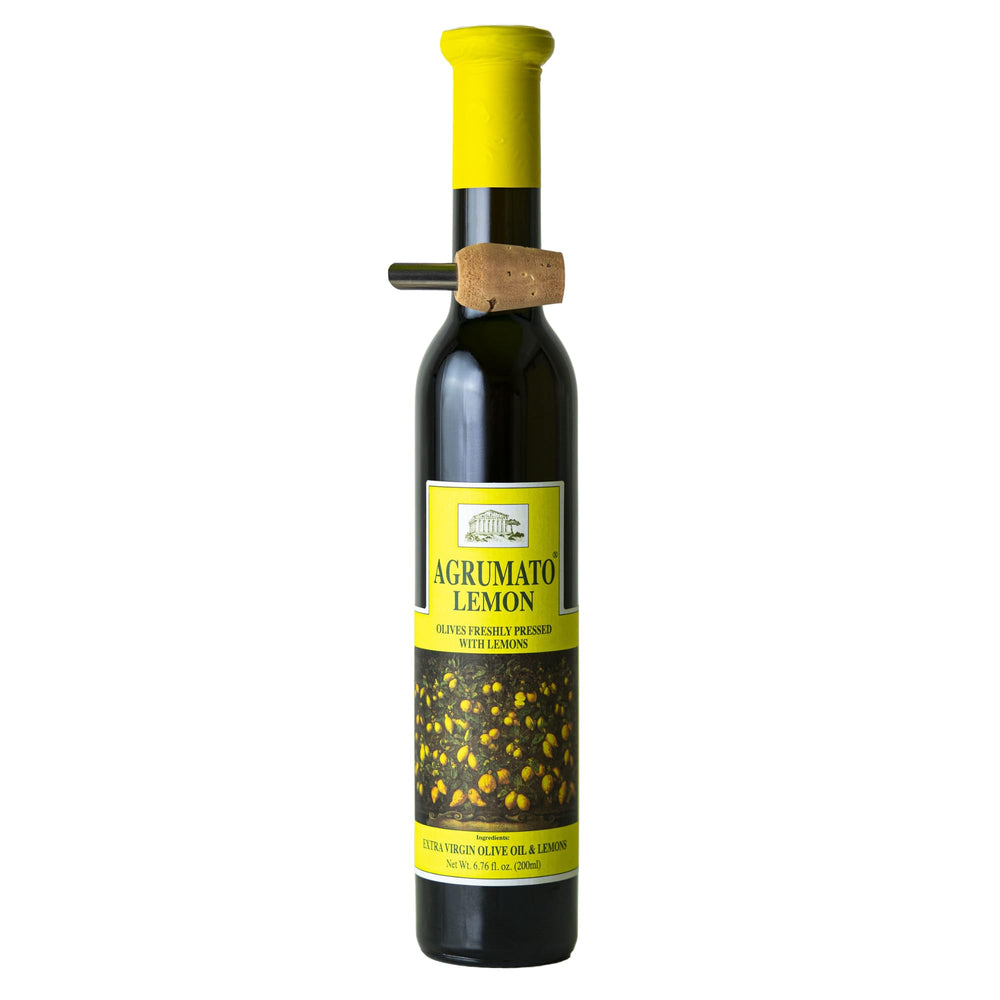 Agrumato bottle front view showing elegant packaging and premium finishing oil benefit