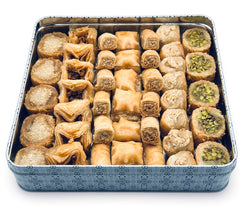 Al Bohsali pistachio-topped piece detail showcasing fresh nut topping