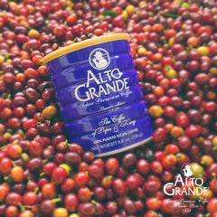 Alto Grande ground coffee pouring to show texture and rich color benefit