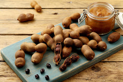 Amazing Chiles & Spices tamarind pods being used in a kitchen for sauces and marinades