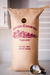 Amish Country Popcorn open 50 lb bag pouring kernels to show quantity and grain quality