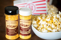 Amish Country Popcorn open jars showing powder texture and scoopable seasoning convenience