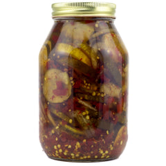 Amish Wedding jar size comparison beside a measuring cup to indicate 32-ounce scale