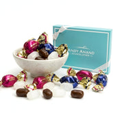 ANDY ANAND CHOCOLATIER front packaging showing 7 oz bag and branding benefits portioned treats