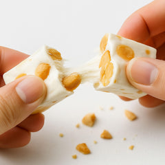 ANDY ANAND sliced nougat pieces on plate ready for serving and sharing