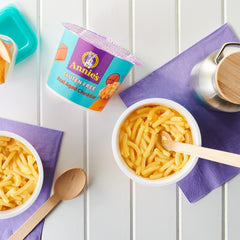 Annie's close-up of aged cheddar cheese packet showing real cheese for rich flavor