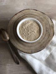 Anthony's scoop of black maca beside teaspoon showing serving size guidance