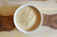 Anthony's prepared oat milk in glass demonstrating creamy plant-based milk