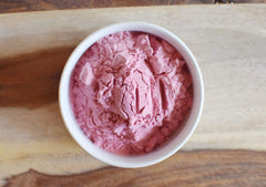Anthony's powder dissolved in a glass illustrating quick mixability and bright color