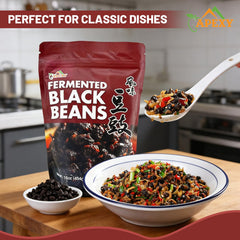 Apexy minced black bean paste on spoon demonstrating ease of blending flavors