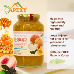 APEXY spoon lifting glossy peach-oolong mixture demonstrating thick scoopable texture