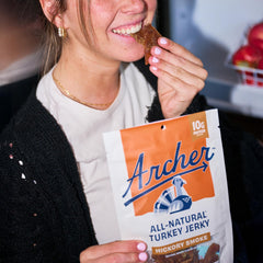 Archer Jerky on hiking trail showing brand as durable outdoor protein snack