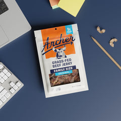 Archer Jerky original on a trail setting showing outdoor snack fuel and portability
