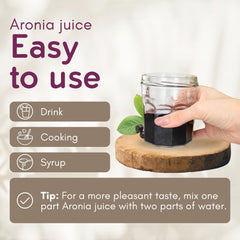 Aronia Original close-up of juice texture highlighting deep purple color