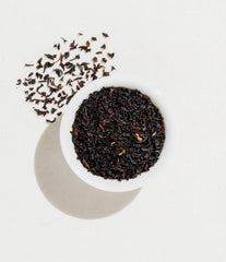 Art of Tea brewed cup top view with rich amber color indicating smooth maltiness
