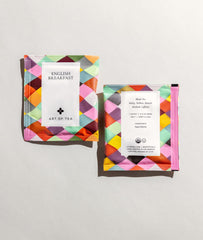 Art of Tea pyramid sachet close-up revealing whole-leaf expansion for fuller flavor