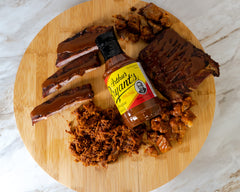 Arthur Bryant's Sweet Heat glazed on ribs illustrating sticky shine and balanced sweet kick
