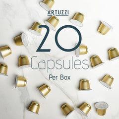 Spread of Artuzzi capsules beside a ruler to show pack quantity and scale