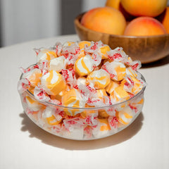 Assortit handful of taffy in hand demonstrating portion size and shareability