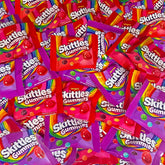 Assortit Skittles gummies front packaging showing resealable bag and weight