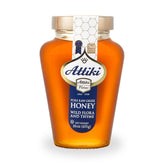 Attiki jar front view showing caramel color and brand, perfect pantry staple