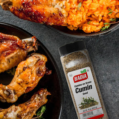 Badia cumin seeds on spoon showing scale and convenient 16 oz quantity benefit