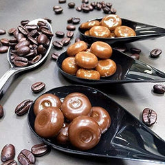 Bali's Best open bag with candies spilling out showing quantity and resealable use