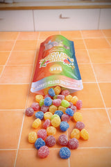 Bear Necessities bowl of sour buttons in party setting showing shareable appeal