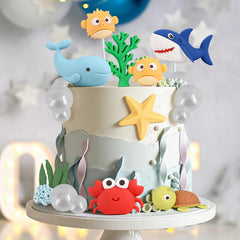 BHNKGZNA pufferfish, starfish and foam pearls clustered to add depth and color