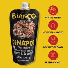 Bianco DiNapoli sauce being spread on dough for quick pizza assembly