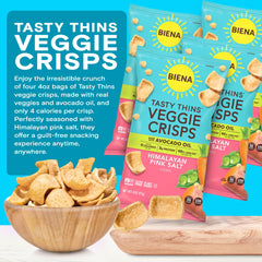 BIENA scoop-shaped chip dipped into hummus demonstrating sturdy scoopability for dips
