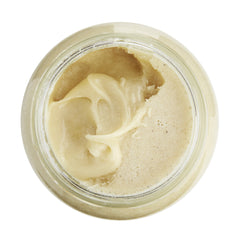 Big Island Bees spoon lifting spreadable Lehua honey to show creamy texture and scoopability