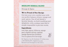 Bigelow brewed cup in a kitchen setting with orange slice, suggesting cozy refreshment