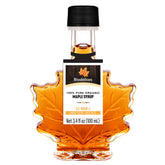 BIODELICES maple leaf bottle front view showing elegant packaging and pure syrup