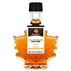 BIODELICES maple leaf bottle front view showing elegant packaging and pure syrup