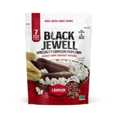 Black Jewell front packaging showing crimson popcorn bag and clear label benefit