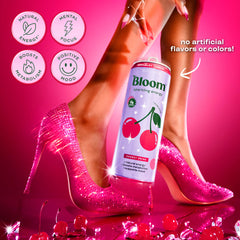 Bloom Nutrition poured into a glass displaying color and fizzy texture for refreshing benefit