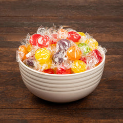 Blunon close-up of glossy candy discs highlighting texture and color for appealing bite