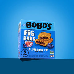 Bobo's ingredients flatlay with oats and figs emphasizing whole grain benefits