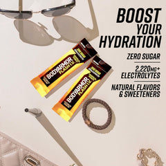 BODYARMOR mixed tropical punch drink in glass with ice for refreshment