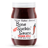 Bone Suckin' 16 oz bottle front label showing bold hot bbq flavor and sticky promise