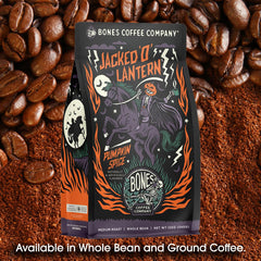 Bones Coffee whole beans on spoon highlighting quality Arabica beans and smooth flavor benefit