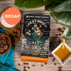 Whole Arabica beans for Bones Coffee Salty Siren close-up showing roast color and smooth surface
