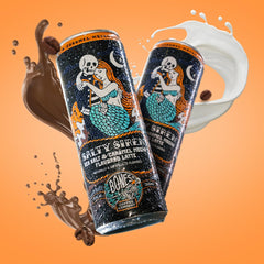Bones Coffee Company pouring latte into glass for immediate enjoyment