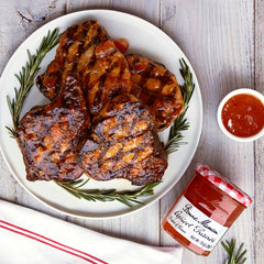 Bonne Maman cherry preserve spooned over toast illustrating rich color and versatile serving idea